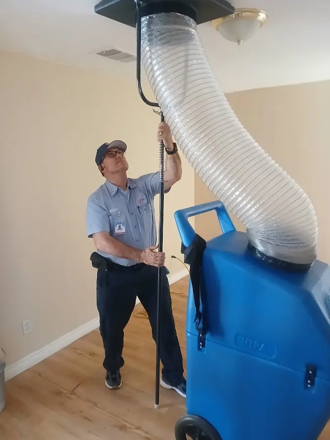 Mini Split Installation technician using HEPA equipment in Falls Church